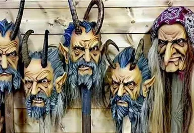 A series of spooky masks with horns and long beards. These figures exhibit a terrifying and mystical appearance.