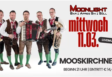 A band in traditional costume stands together and plays musical instruments. The event takes place on Wednesday, March 11th, at the Moonlight Bar.