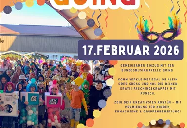 Ein bunter Faschingsumzug in Going mit fröhlichen Menschen in Kostümen. Das Event findet am 17. Februar 2026 auf dem Dorfplatz statt.