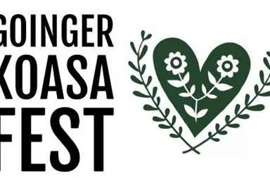 Ein kreatives Logo für das Goinger Koasa Fest. Es zeigt ein herzförmiges Design mit Blumen und Blättern.