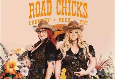 Two women in cowboy hats pose in front of a blooming background. They represent the music styles country, rock, and pop.