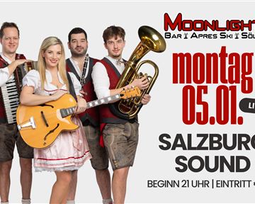Eine Band namens Salzburg Sound steht in traditioneller Tracht. Sie spielt am Montag, den 05. Januar, im Moonlight Bar in Söll mit Livemusik.