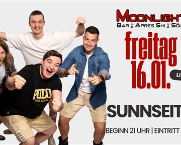 A group of four people is happily posing in front of a banner. The banner promotes a live music event at the Moonlight Bar in Söll.