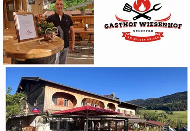 Ein einladender Gasthof mit einem gemütlichen Restaurantbereich und schöner Außenterrasse. Im Hintergrund ist der Gasthof Wiesenhof zu sehen, umgeben von grüner Landschaft.