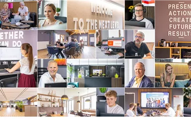 A modern office landscape with various work areas and creative people. There are motivating quotes on the walls and a bright, inviting atmosphere.