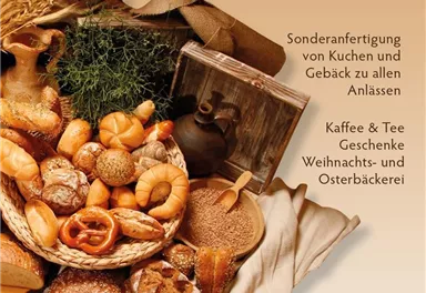 An appealing arrangement of various baked goods and bread. 

Individual cake specialties for all occasions are offered, along with coffee and tea.