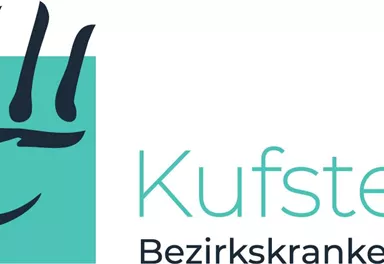 A logo of the Kufstein District Hospital is visible. It features a stylized hand and the inscription "Kufstein District Hospital".