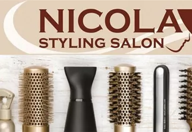 A styling salon with various hairdressing supplies such as brushes and scissors. The logo of "Nicola Styling Salon" stands out clearly.