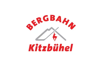 A logo of the Kitzbühel cable car. It features the name in red and gray with a stylized mountain range.