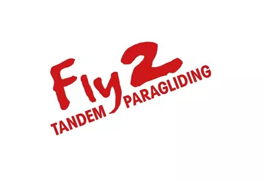 A simple and eye-catching logo for Fly2. It features the name and the offer of Tandem Paragliding in a vibrant font.