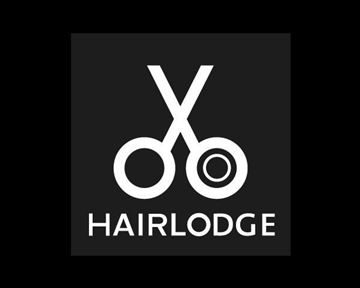 A simple logo with scissors and the inscription "HAIRLODGE". The design is modern and clear on a black background.