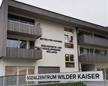 A modern building that serves as a social center. It offers assisted living and health services.