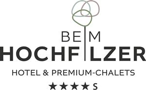 A stylish logo for the hotel and premium chalets "Beim Hochflzer". It features elegant lettering and a modern design.