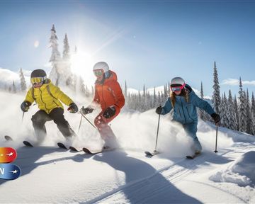 Drei Skifahrer in bunter Ausrüstung fahren durch frischen Pulverschnee. Im Hintergrund leuchten die verschneiten Bäume unter einem strahlend blauen Himmel.