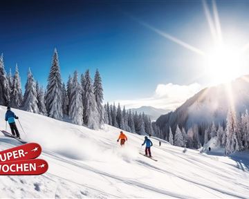 A picturesque winter scene with skiers on a snowy slope. In the background, the sun shines over snow-covered trees and mountains.