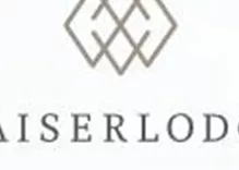 An elegant logo with the inscription "KAISERLODGE". It has a stylized, geometric shape in the center.