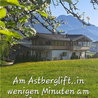 A sunny day at the Astberglift with a view of the mountains. The green grass and the surroundings invite you to relax.