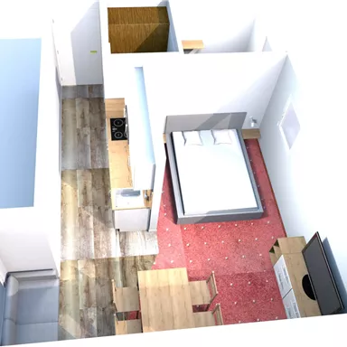 Eine kleine, moderne Unterkunft mit einem Schlafzimmer, Tisch und Stühlen sowie einer Küchenzeile. Der Raum hat helle Wände und einen einfachen, eleganten Stil.