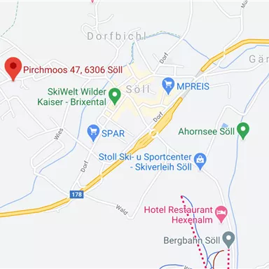 Eine Karte, die den Standort von Pirchmoos 47 in Söll zeigt. Nahegelegene Sehenswürdigkeiten und Geschäfte sind ebenfalls eingezeichnet.