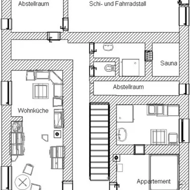 Das Bild zeigt einen Grundriss eines Hauses oder einer Wohnung. Die verschiedenen Räume sind klar eingezeichnet, darunter eine Wohnküche, ein Apartment und eine Sauna.