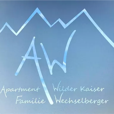 A stylized logo featuring mountain lines and the text "Apartment Wilder Kaiser." Below it is written "Family Wechselberger."
