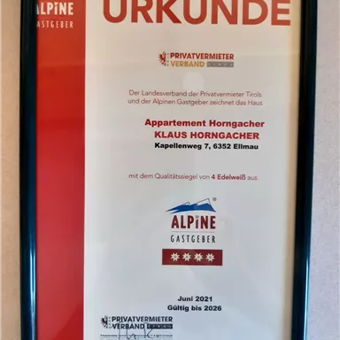 A certificate for the Appartement Horngacher in Ellmau. The award shows the quality level of 4 Edelweiss as an Alpine host.