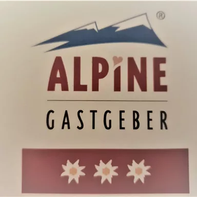A logo with the text "ALPINE GASTGEBER" and a mountain symbol. Below, three stars are depicted, symbolizing hospitality and quality.