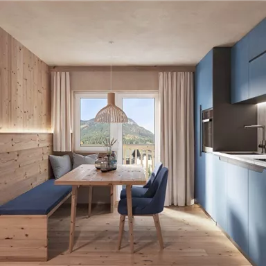 A modern dining room with wood paneling and large windows. The table is set and the view of the mountains is visible.